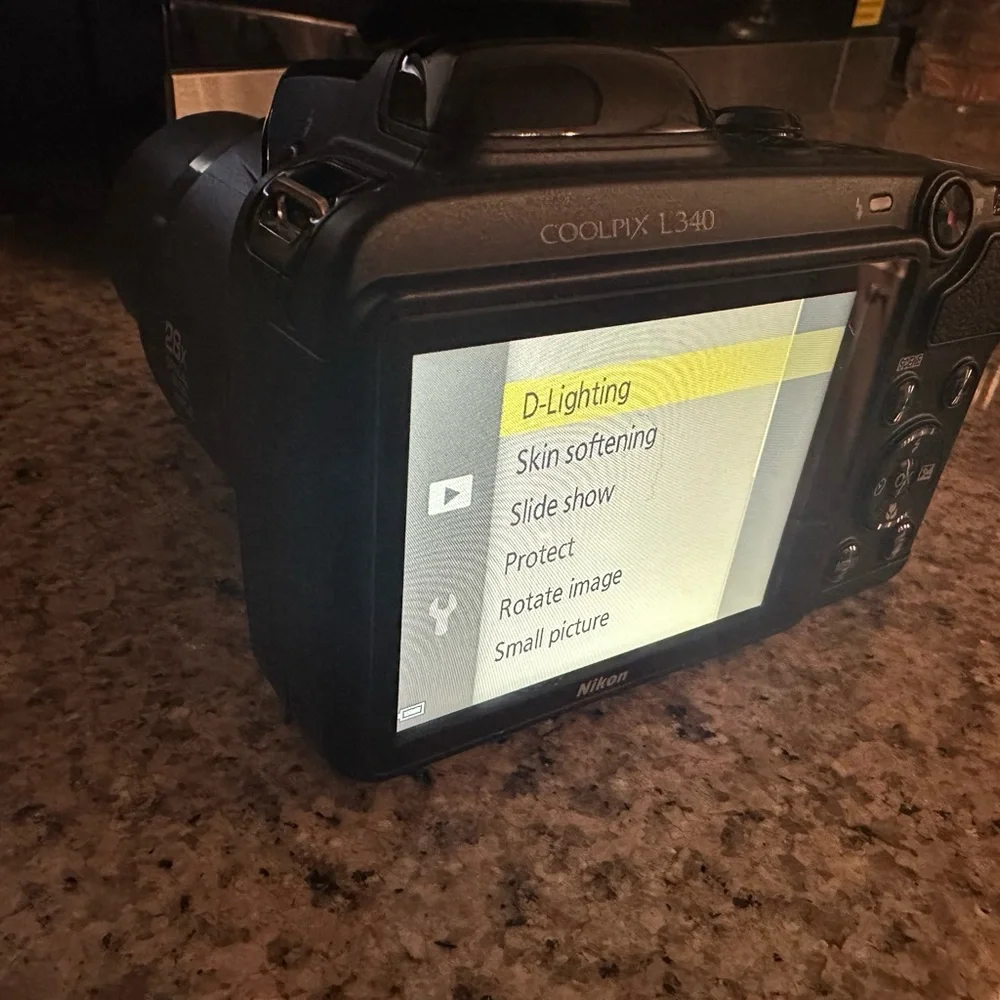 Great camera in great shape. 28x optical zoom wide lens. 20.2Mp point and shoot